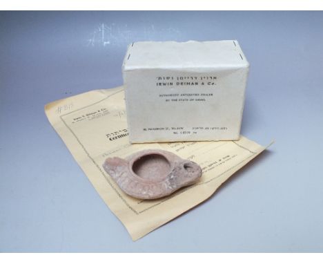 A ROMAN TERRACOTTA OIL LAMP, contained in original retailers box, complete with certificate, W 9.5 cm