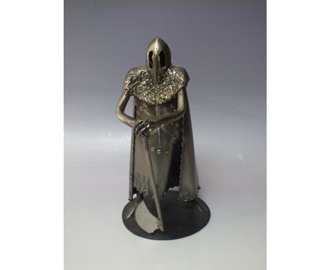 RON LYON - A 20TH CENTURY STEEL SCULPTURE 'THE EXECUTIONER', in the form of a robed and helmeted figure with an axe, H 24 cm
