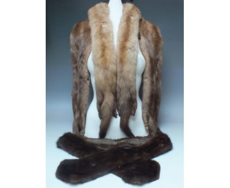 A VINTAGE DAWN MINK FUR STOLE, comprised of four pelts, together with a double pelt mink stole and a mahogany brown mink fur 