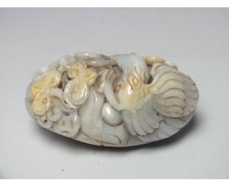 A LATE 19TH / EARLY 20TH CENTURY CHINESE WHITE JADE TOUCHSTONE, carved with various bird studies, L 8 cmNote: Origin or treat