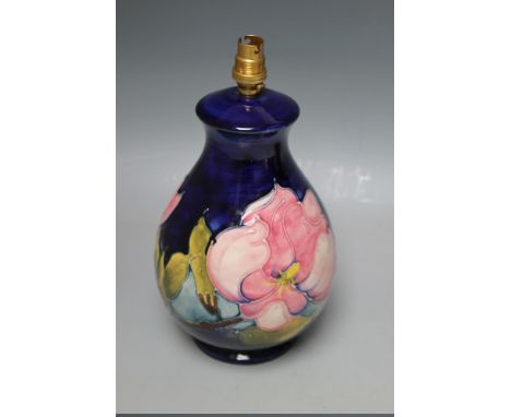 A MOORCROFT 'MAGNOLIA' PATTERN SMALL TABLE LAMP, impressed marks to base, overall H 23.5 cm
