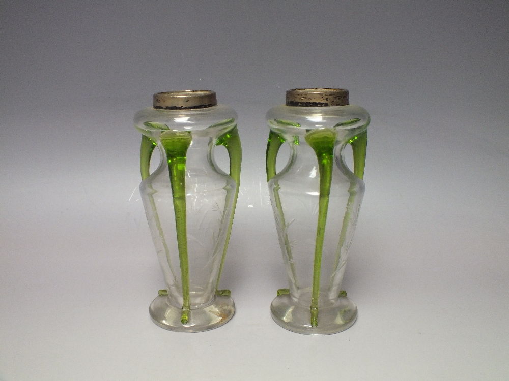 A PAIR OF HALLMARKED SILVER RIMMED EDWARDIAN GLASS VASES, clear ground