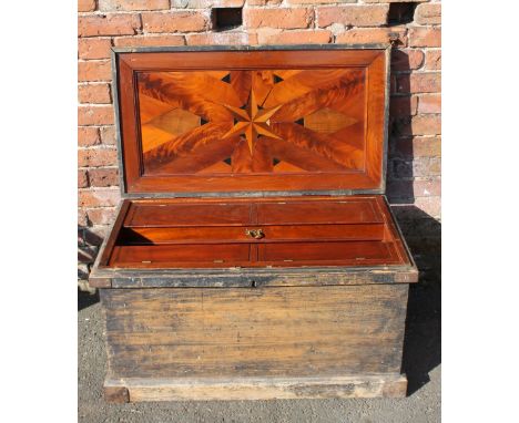A LATE 19TH CENTURY FITTED TOOL CHEST, the hinged lid opening to reveal an inlaid starburst design, fully fitted mahogany int