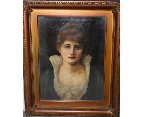A LATE 19TH / EARLY 20TH CENTURY PORTRAIT STUDY OF A YOUNG WOMAN, unsigned, oil on canvas laid on board, framed and glazed, 3
