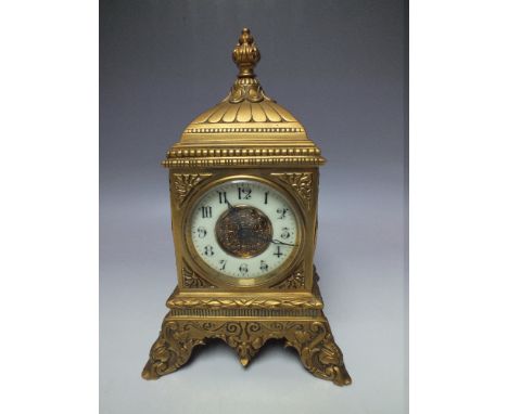 A 20TH CENTURY GILT METAL MANTEL CLOCK, of square form, the circular dial with Arabic numerals, outer minute track and centra