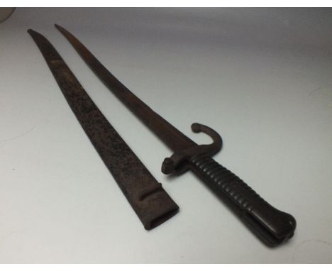 A VINTAGE BAYONET WITH METAL SCABBARD, no obvious markings overall length of bayonet approx 69.5 cm