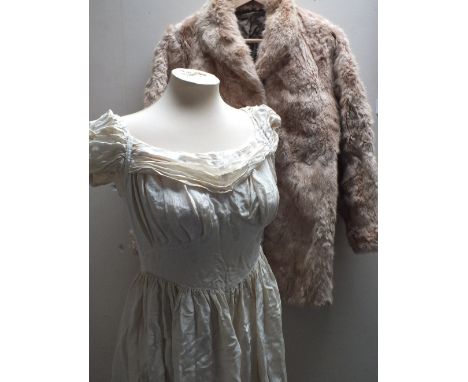 A VINTAGE WEDDING DRESS, together with four pairs of vintage gloves and a vintage coney fur jacket