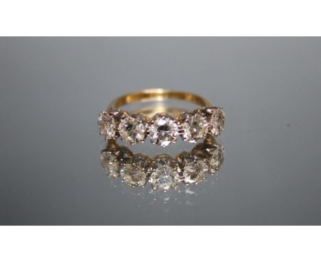 A FIVE STONE DIAMOND SET HALF ETERNITY RING, set with five brilliant cut diamonds totalling approx 2 carats, ring size M 