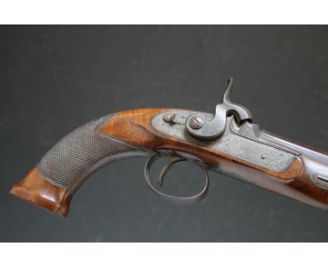 AN EARLY 19TH CENTURY PERCUSSION HOLSTER PISTOL BY SOUTHALL OF LONDON, the octagonal barrel signed 'London' in gilt, the lock