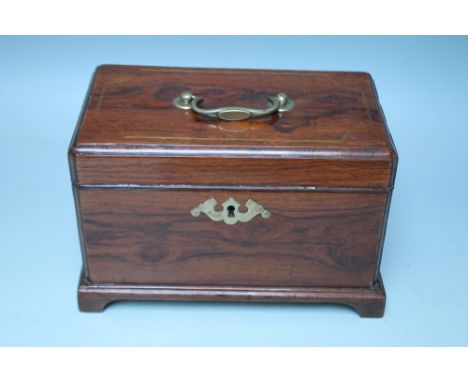 A 19TH CENTURY ROSEWOOD TEA CADDY, having three lidded compartments to the interior, brass carry handle and raised on bracket