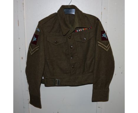 British Army khaki green dress uniform jacket having Clarence Clothing Co Ltd label "Battledress Blouses 1940 pattern, size n