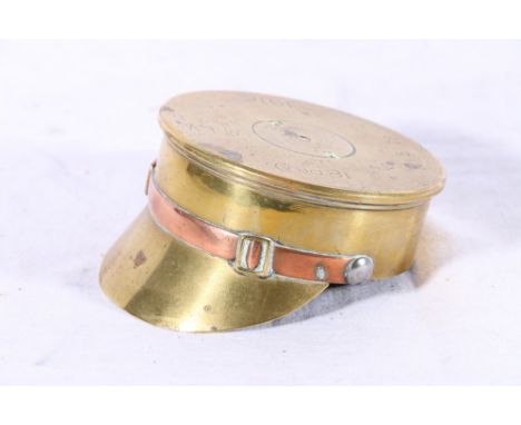 Trench art soldier's peaked cap made from a WWI 18 pounder brass shell casing dated 1916, 10cm diameter 