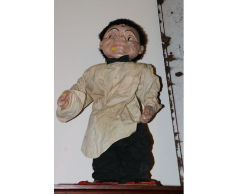Mid 20th century shop window or counter mannequin in the form of a boy wearing shirt and bowtie having articulated arms, poss