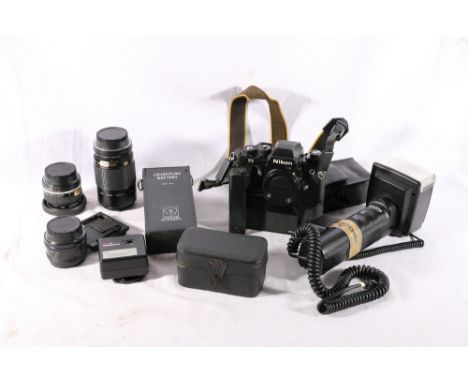 Nikon F3 camera with motor drive MD4 attachment, Bell and Howell 52mm Skylight lens, Nikon Sirius 1:2.8 f=28 lens, Nikon Nikk