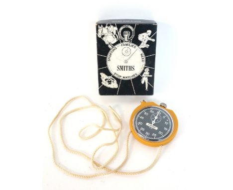 1970's 'SMITHS EMPIRE' STOPWATCH
with a black dial marked for seconds and a subsidiary dial marked for 30 minutes, with two b