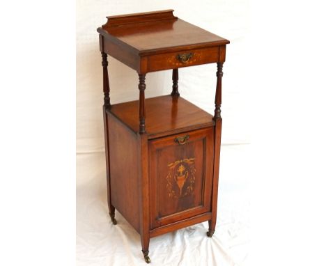 EDWARDIAN MAHOGANY COAL PURDONIUM
with a shaped raised back and shelf on turned tapering supports above an inlaid door, stand