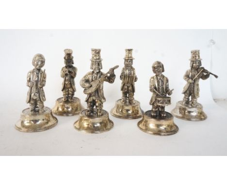 SET OF SIX CONTINENTAL SILVER PLATED MUSICIAN FIGURES
playing various instruments, raised on circular bases, each approximate