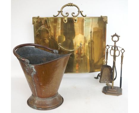 SELECTION OF FIRE TOOLS
including a copper helmet coal scuttle, a shaped brass fire screen, a small companion set and a potte