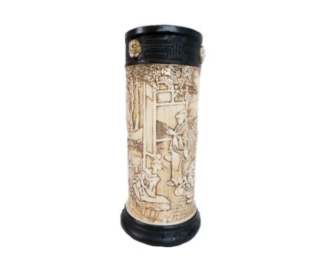 BRETBY JAPANESE STYLE POTTERY STICKSTAND
the rim with relief mask detail and the body decorated with Geisha and figures in ga
