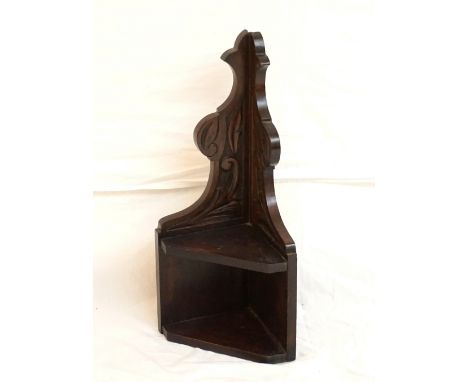 CARVED HANGING CORNER SHELF
of shaped outline with two open shelves, 62cm high