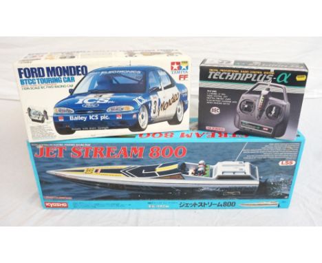 RADIO CONTROLLED FORD MONDEO BTCC TOURING CAR
by Tamiya, 1/10 th scale, boxed, a radio controlled Jet Stream 800 by Kyosho, b