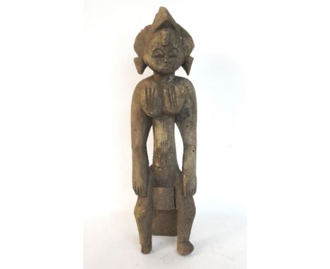 VINTAGE SENUFO CARVED WOODEN FEMALE FIGURE
seated on a stool, approximately 50.5cm high