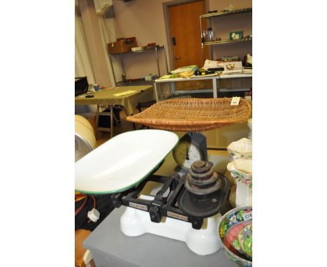 A Hughes baby weigher, no. 48B; and a pair of W. & T. Avery Ltd., kitchen scales.