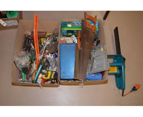 A Black & Decker electric chain saw; two Spear E. Jackson saws; drill parts; and other tools, in two boxes.