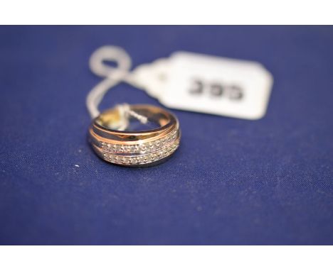 A diamond and 9ct. yellow gold gent's dress ring, 5.2grms gross.