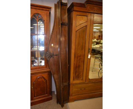 A mahogany back panel from a 19th Century sideboard, fitted a shaped shelf with carved brackets.