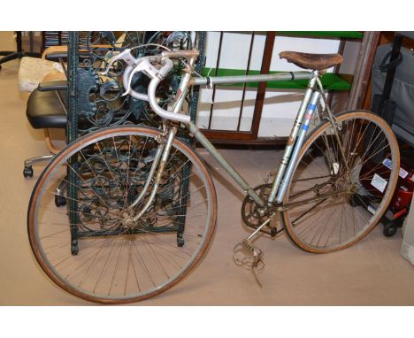 A gent's vintage road racing bicycle by H. Grub of London; together with three water bottles.