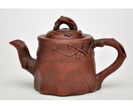 Chinese Yixing-type stone ware teapot and cover, of gnarled branch form, the cover with applied prunus blossom decoration, se