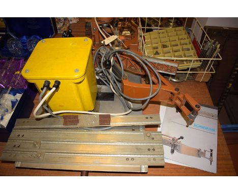 A Scripta No. GP68 engraving machine and associated equipment, with a Suregrave manual (possibly missing parts).