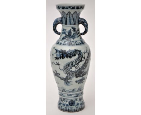 Chinese Yuan style blue and white slender vase, of inverted baluster form with dragon chasing flaming pearl beneath Phoenix a