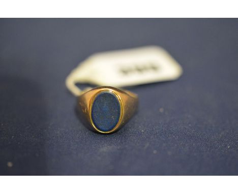 A lapis lazuli and 9ct. yellow gold gent's signet ring, 6.2grms gross.