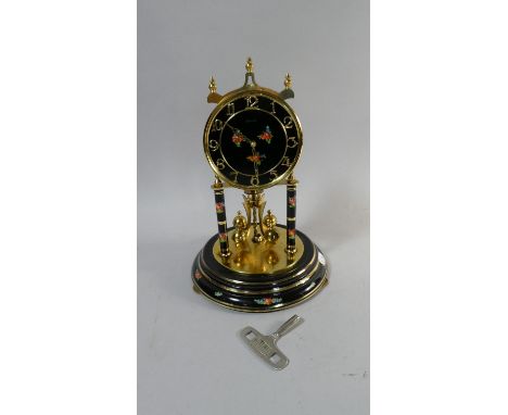A Kundo Enamelled Pillar Clock Under Plastic Dome, 30cm High 