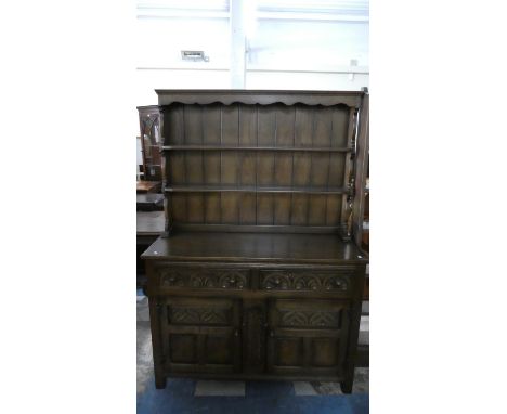 An Oak Dresser with Two Drawers Over Cupboard Base and Two Shelf Plate Rack, 122cm Wide 