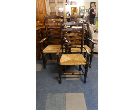 A Harlequin Set of Three Rush Seated Ladder Back Arm Chairs 