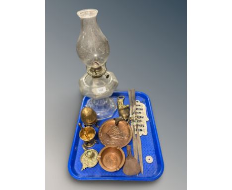 A clear glass oil lamp, brass mortar and pestle, pair of African style miniature spears, other metal wares. 