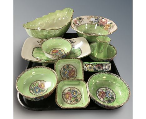 A collection of Maling lustre china on green ground.