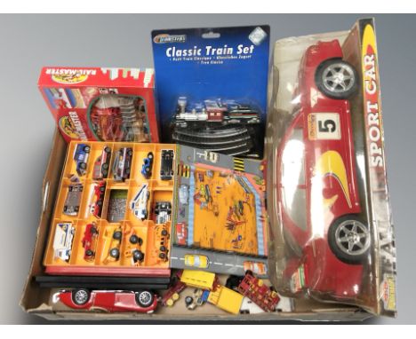 A group of modern die cast cars and models including Bburago. (1 box)
