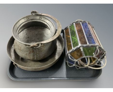 A leaded stained glass hanging lantern, a swing handled cooking pot and a further dish.