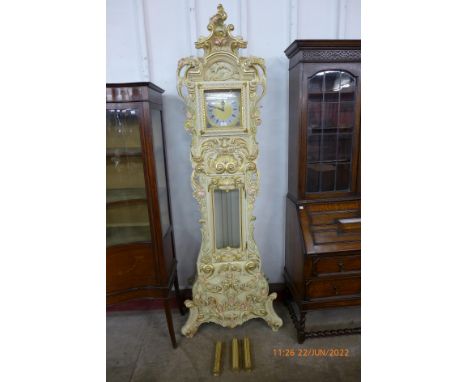 An Italian cream and parcel gilt quartz longcase clock 
