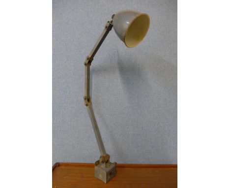 An industrial grey metal anglepoise lamp 