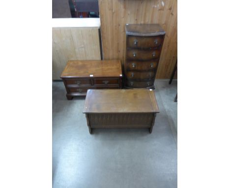 A walnut bow front chest of drawers, small oak blanket box and a mahogany TV unit 