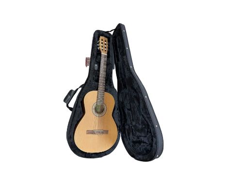 A La Patrie 'Etude' classical acoustic guitar and Kinsman lined case. Serial number: 03036192.Light scratching to the front o