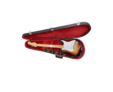 A 1960s/1970s stratocaster-style electric guitar marked Tokai Goldstar Sound in sunburst.With generic black hardcase and Fend