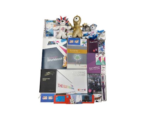 A large collection of Olympics 2012 official gamesmakers memorabilia, to include: - EDF limited edition book - Various pin ba