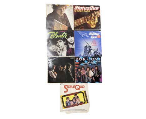 A collection of pop/rock 12" vinyl LPs, to include: - Bon Jovi: You Give Love a Bad Name - Status Quo: Pictures of Matchstick