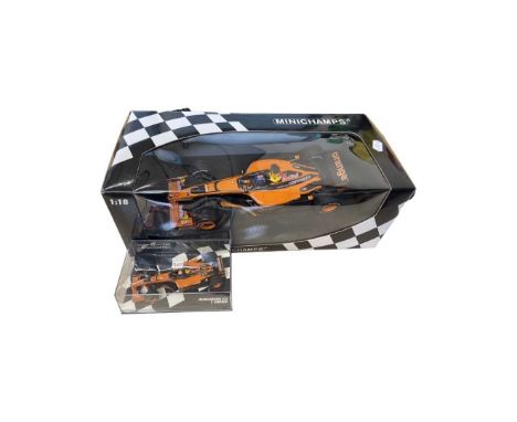 A boxed Minichamps 1:18 scale model: Orange Arrows 2002 Showcar, together with a smaller 1:43 scale model.